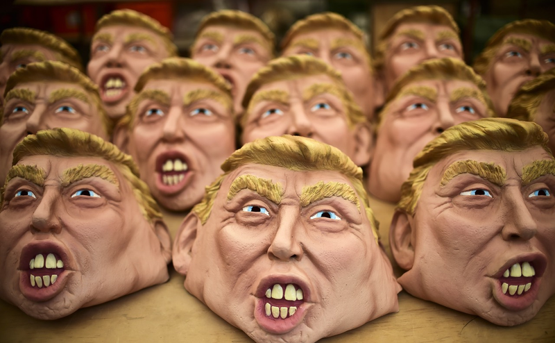 Trump masks of the more Nixonian variety being produced in Mexico (Ronaldo Schemidt/AFP/Getty Images)